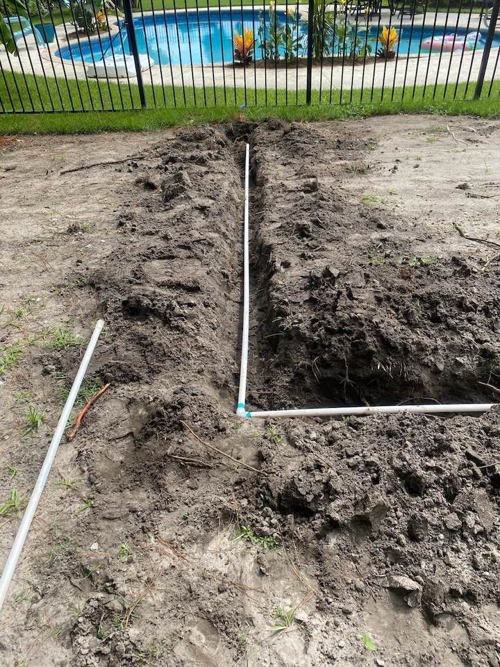 Sprinkler irrigation system watering a residential lawn in Brunswick, GA